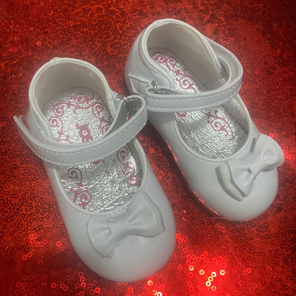 White pretty little shoes